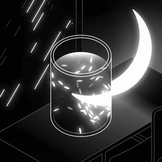 Glass of water with the Moon reflection inside