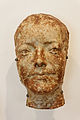 Sculpture, un masque de jeune fille en grès émaillés réalisée par Jean Carriès (1855-1894).
