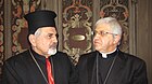 Maurizio Malvestiti (droite) accueille à l'évêché de Lodi le patriarche Ignace Joseph III, le 20 février 2017.