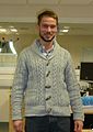 Image 52Man wearing shawl collar cardigan and hipster-inspired beard (from 2010s in fashion)