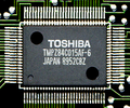 Il Toshiba TMPZ84C015, uno Z80 standard con diverse periferiche della famiglia Z80 integrate in un unico chip, in formato QFP.