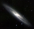 NGC 253, una galassia spirale barrata nella costellazione dello Scultore.