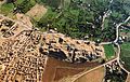 Въздушна снимка над града, в която изпъкват археологическите разкопки