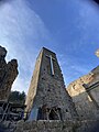 Particolare della torre campanaria, anteposta e relativa alla chiesa di San Giovanni Battista.
