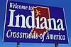 Indiana's motto, Crossroads of America, on a state welcome sign.