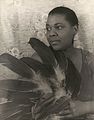 Image 4 Bessie Smith Photograph credit: Carl Van Vechten; restored by Adam Cuerden Bessie Smith (April 15, 1894 – September 26, 1937) was an American blues singer widely renowned during the Jazz Age. She is often regarded as one of the greatest singers of her era and was a major influence on fellow blues singers, as well as jazz vocalists. Born in Chattanooga, Tennessee, her parents died when Smith was young, and she and her sister survived by performing on the streets of Chattanooga, Tennessee. She began touring and performed in a group that included Ma Rainey, and then went out on her own. Her successful recording career began in the 1920s, until an automobile accident ended her life at age 43. More selected pictures