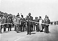 Image 11Ribbon ceremony to open the Sydney Harbour Bridge on 20 March 1932. Breaking protocol, the soon to be dismissed Premier Jack Lang cuts the ribbon while Governor Philip Game looks on. (from History of New South Wales)