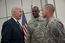Vice President Joe Biden, Austin, and Command Sergeant Major Earl Rice, at an event marking the award of the Iraq Commitment Medal in December 2011