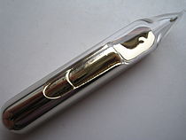 Hình: Caesium metal in a glass ampoule