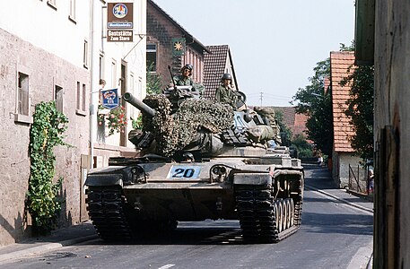 United States M60A1 Patton of the 8th Infantry Division in the village of Michelrieth, Germany during exercise Reforger '82, September 1982.