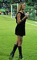 Image 47Sports anchor wearing little black dress and knee-high boots, Mexico, 2010 (from 2010s in fashion)