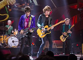 The Rolling Stones во время выступления на фестивале Summerfest[англ.] в Милуоки, 2015 год Слева направо: Чарли Уоттс, Ронни Вуд, Мик Джаггер и Кит Ричардс