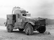 SC 170022 - A French armored car at an airdrome in North Africa. 17 February, 1943 (cropped).jpg