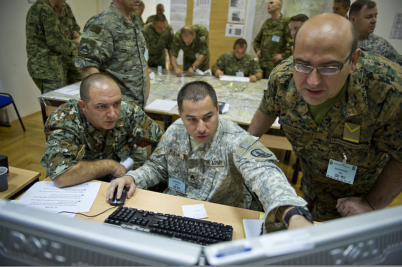 File:A U.S. Army noncommissioned officer, center, assigned to the Joint Multinational Readiness Center in Hohenfels, Germany, reviews data with a Macedonian soldier, left, and a Bosnian soldier during exercise 130825-A-WB953-113.jpg