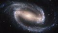 La grande galassia NGC 1300, in cui è molto ben evidente la barra trasversale che attraversa il nucleo.
